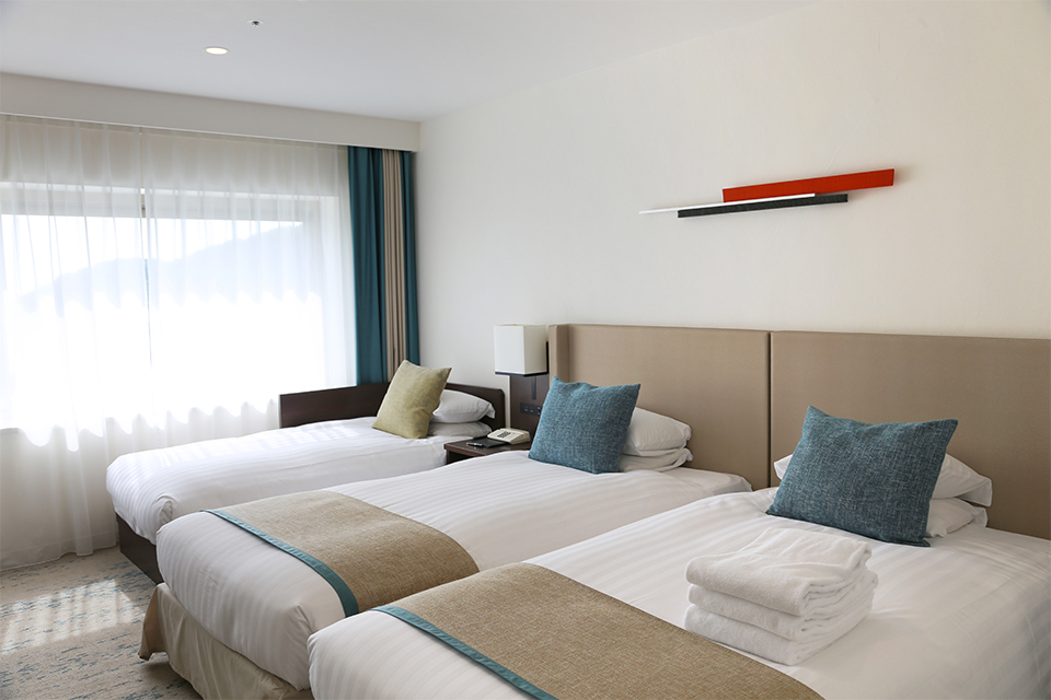 Example of setting up an extra bed when 3 people are using one room.